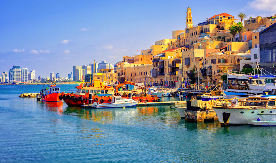Old town and port of Jaffa and modern skyline of Tel Aviv city, Israel (photo via Xantana / iStock / Getty Images Plus)