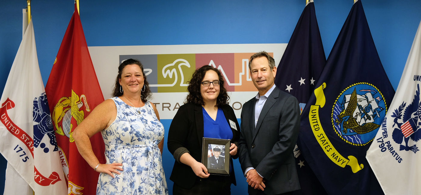 Image: Dream Vacations’ Debbie Fiorino, left, with Lara Herrmann, the 2022 winner, and Brad Tolkin of World Travel Holdings. (Source: Dream Vacations)