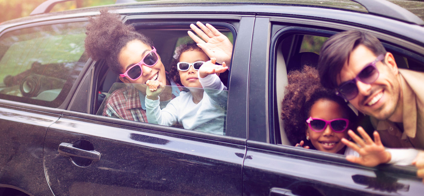 Image: Family traveling by car on vacation. (photo via eli_asenova / Getty Images)