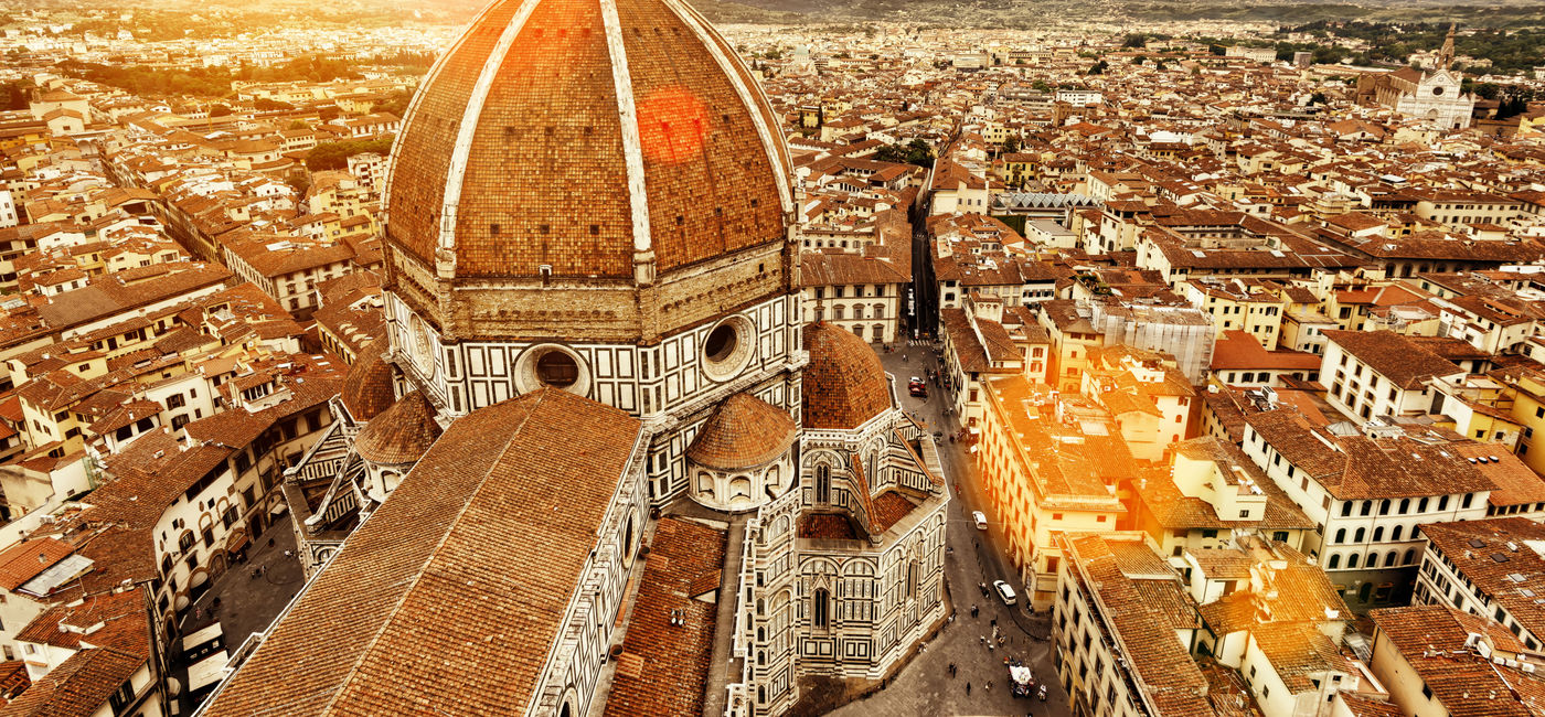 Image: Florence sunny view, Italy. The Basilica di Santa Maria del Fiore (Basilica of Saint Mary of the Flower) in the foreground. (photo via scaliger / iStock / Getty Images Plus)