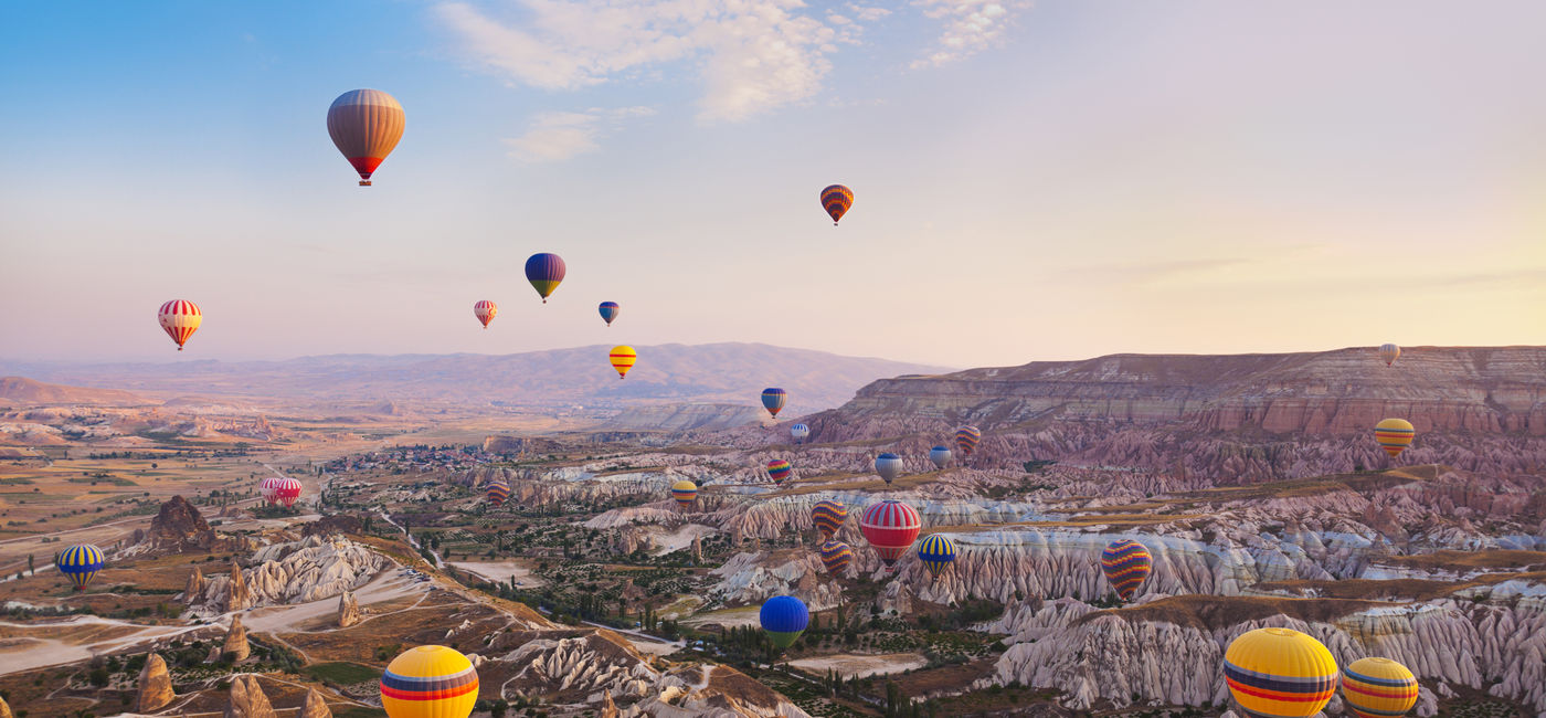 Image: Hot air balloons flying over Cappadocia, Turkey. (photo via TPopova/iStock/Getty Images Plus) (TPopova / iStock / Getty Images Plus)