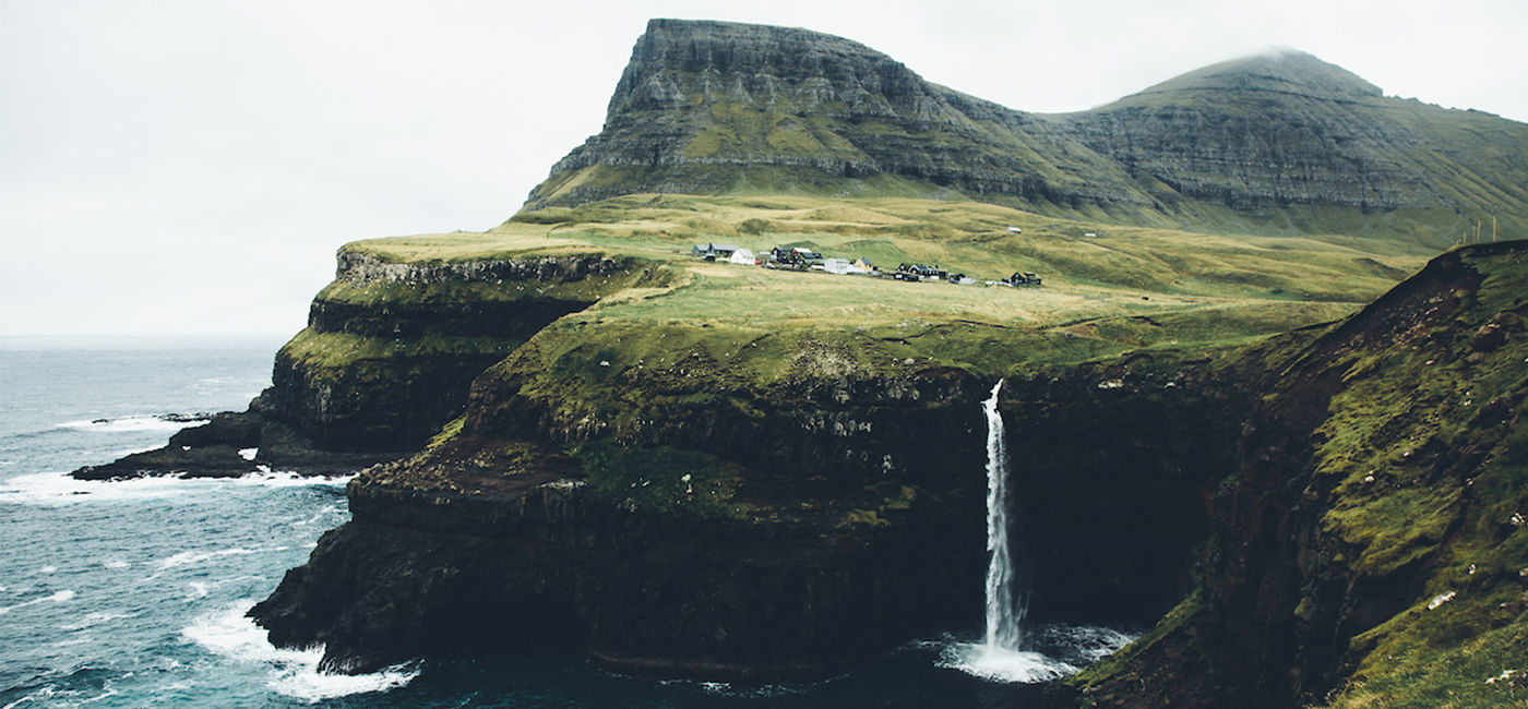 Image: Mulafossur waterfall is located on the remote Faroese island of Vagar. (Photo Credit: Daniel Casson/The Nordics)