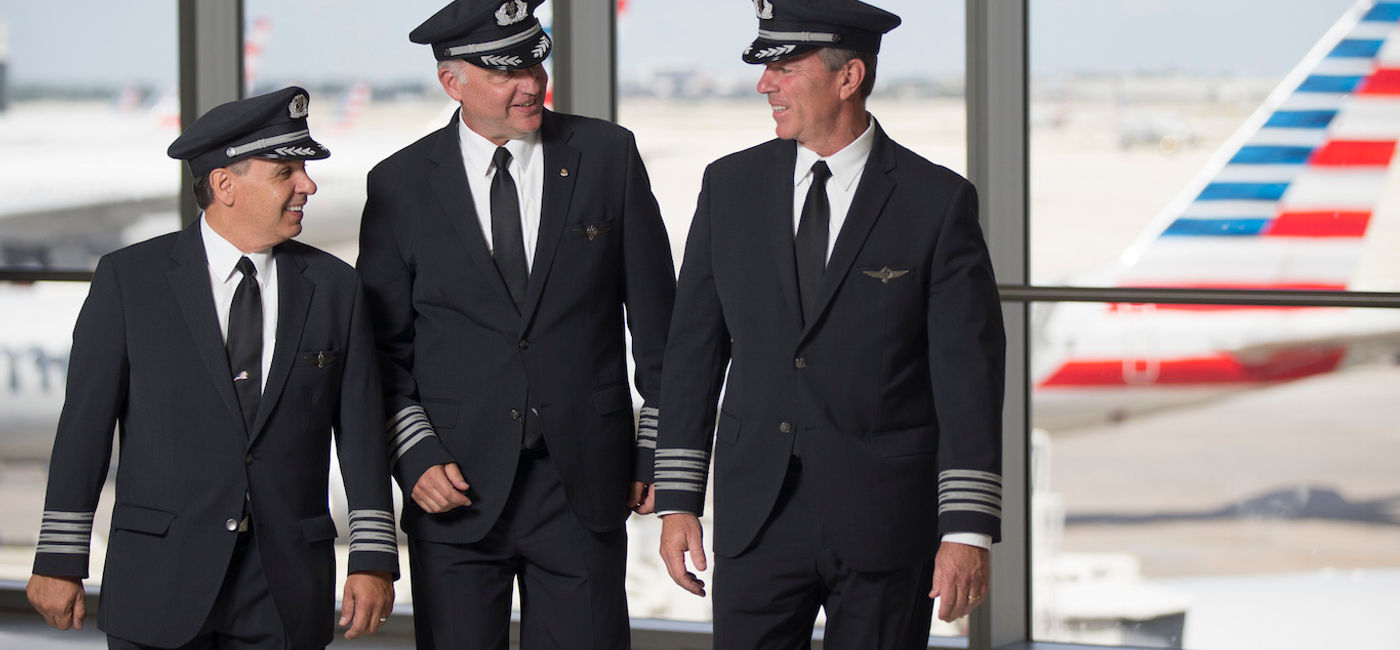 Image: PHOTO: American Airlines pilots conversing at the gate. (photo courtesy of American Airlines (Photo Credit: American Airlines)