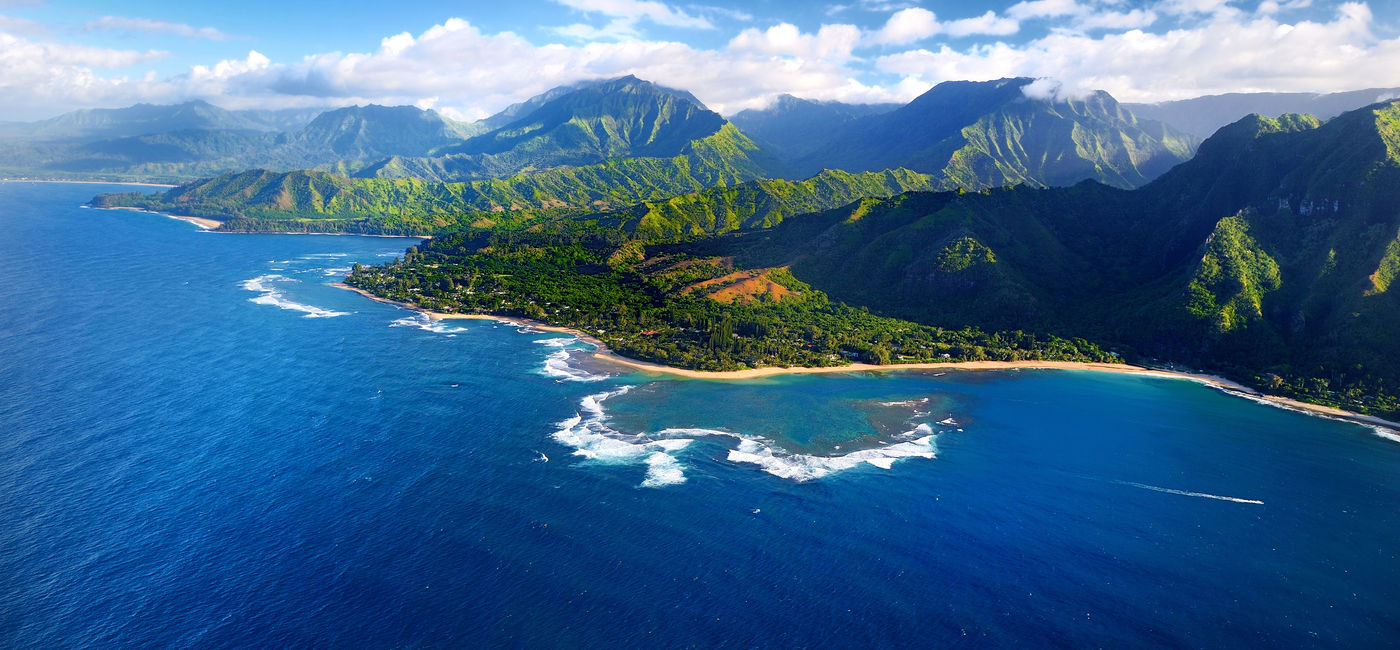Image: PHOTO: Beautiful aerial view of spectacular Na Pali coast, Kauai, Hawaii. (photo via maximkabb / iStock / Getty Images Plus)