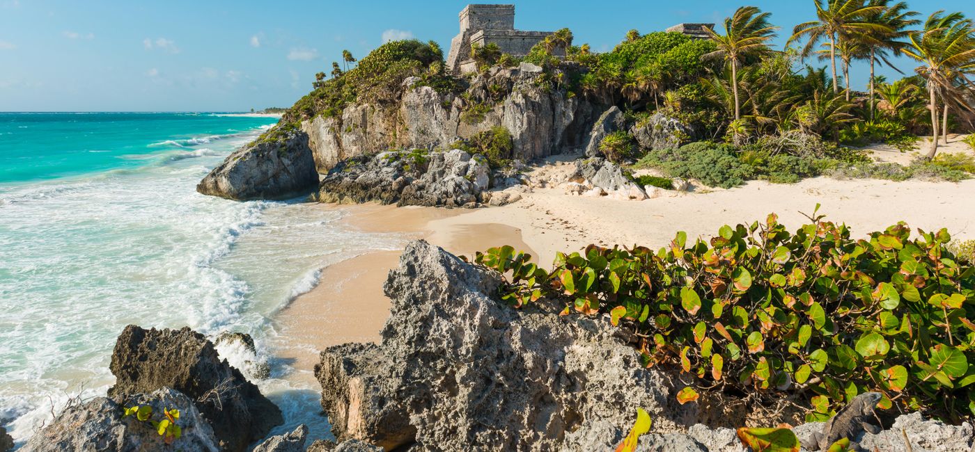 Image: The beach and ruins of the Maya civilization in Tulum. (photo via SL_Photography / iStock / Getty Images Plus)