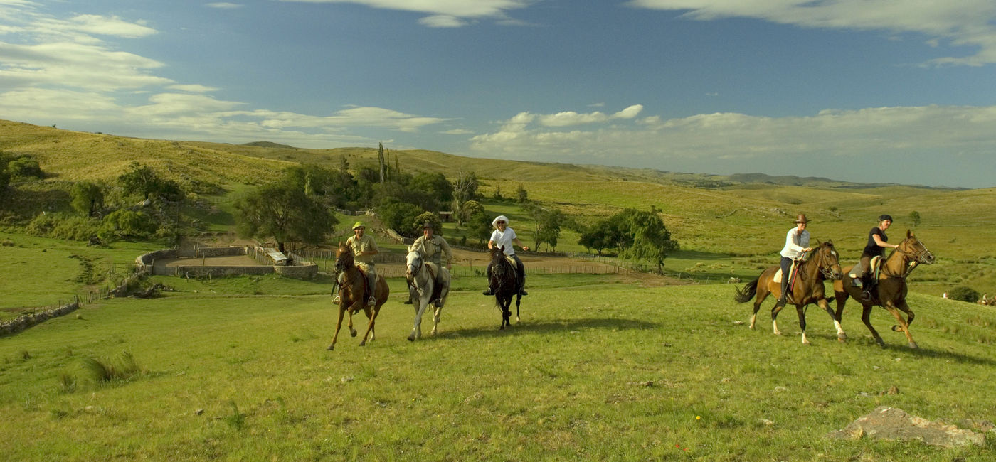 Image: Travelers ride horses at Estancia los Potreros in Argentina. (photo via Astrid Harrison) (Photo Credit: (photo via Astrid Harrison))
