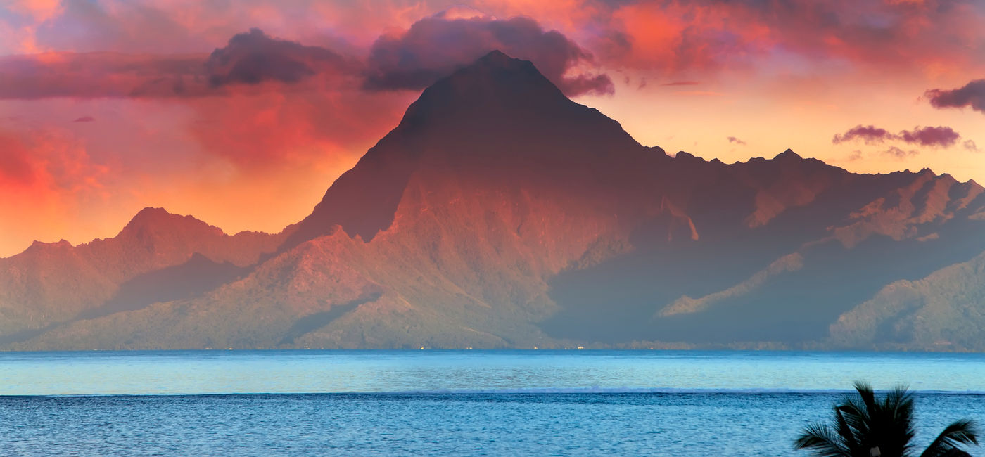 Image: View on mountain Orohena at sunset. Polynesia. Tahiti. (photo via Konstik / iStock / Getty Images Plus)
