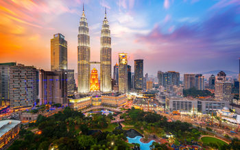 Petronas Towers, also known as Menara Petronas is the tallest buildings in the world from 1998 to 2004. (photo via Rat0007 / iStock / Getty Images Plus)