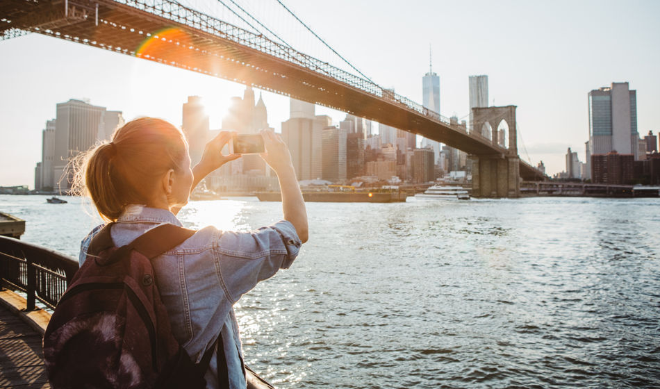 Traveler in New York City taking a picture