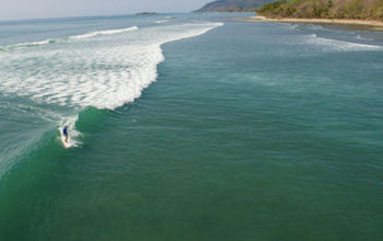Central America is a region with powerful waves for surfer experts from around the world. (Photo via Colin Field).