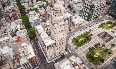 Montevideo, Uruguay, aerial view of downtown buildings and Plaza Independencia square. (photo via rmnunes / iStock / Getty Images Plus)