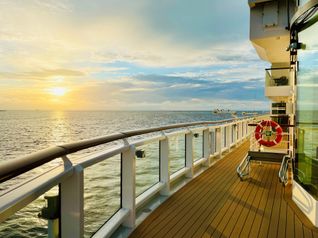 Watching the sunrise from a cruise deck